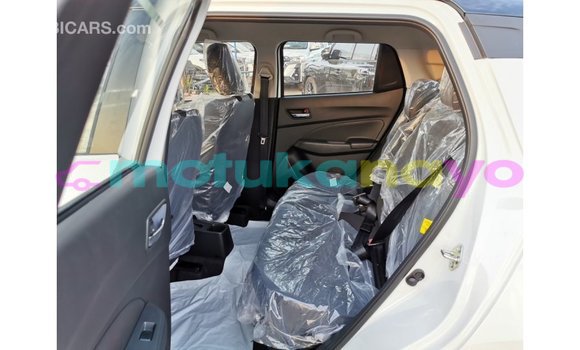 Buy Import Suzuki Swift White Car in Import - Dubai in Bandundu Buy Import Suzuki Swift White Car in Import - Dubai in Bandundu