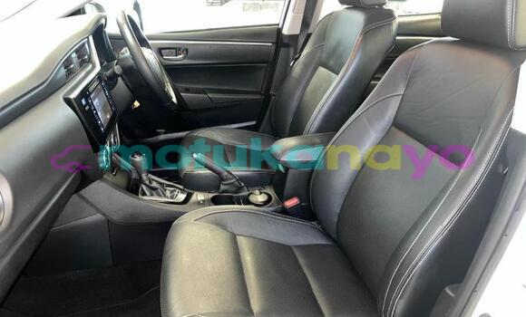 Buy Used Toyota Corolla White Car in Kinshasa in Kinshasa Buy Used Toyota Corolla White Car in Kinshasa in Kinshasa