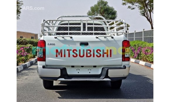 Buy Import Mitsubishi L200 White Car in Import - Dubai in Bandundu Buy Import Mitsubishi L200 White Car in Import - Dubai in Bandundu