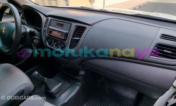 Buy Import Mitsubishi L200 White Car in Import - Dubai in Bandundu Buy Import Mitsubishi L200 White Car in Import - Dubai in Bandundu